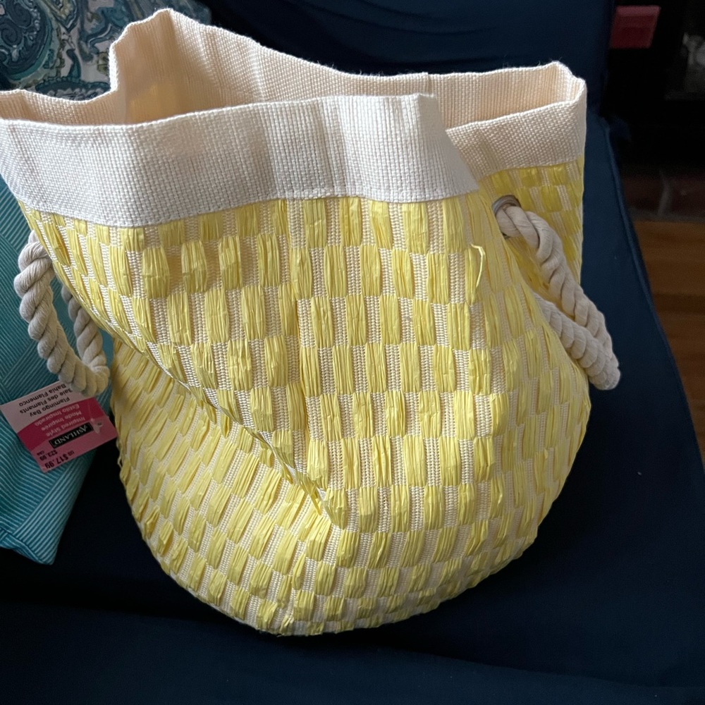NWT fabric basket, round, yellow and cream with two rope handles.